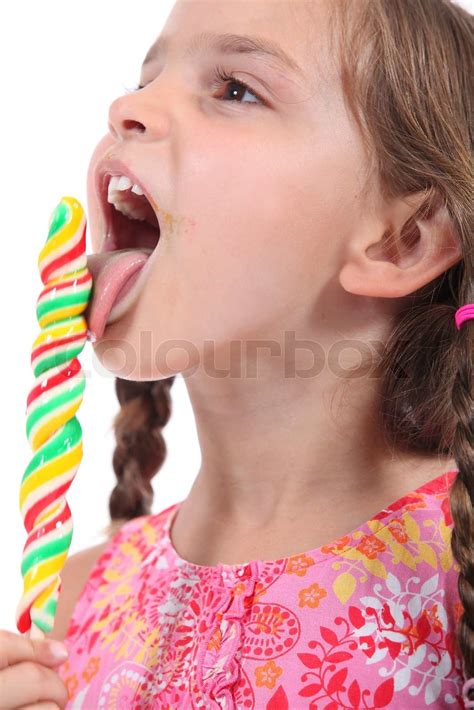 Girl with lollipop | Stock image | Colourbox