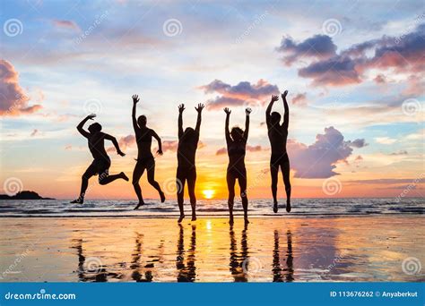 Silhouettes Of Happy Parents Having Good Time With Their Little ...