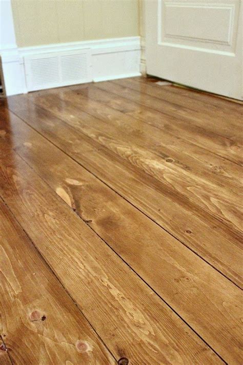 How to Install Beautiful Wood Floors Using Basic Unfinished Lumber ...