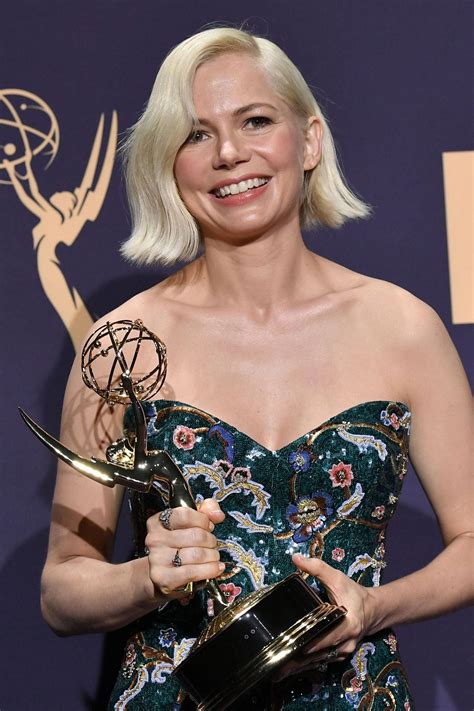 Download Michelle Williams Holding Emmy Awards Trophy at 2019 Ceremony