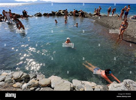 People at the natural spa and thermal springs, Therma beach, Kos Stock ...