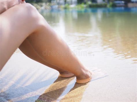 Soak Your Feet in the Water by Swimming Pool Stock Image - Image of ...
