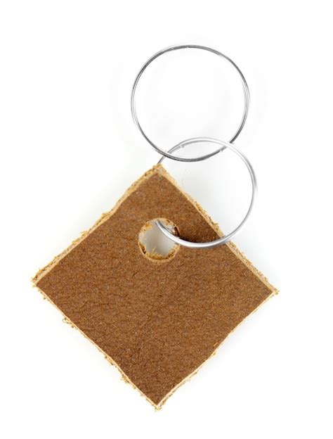 Premium Photo | Leather trinket isolated on white