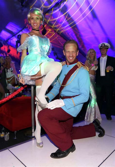 Playboy at 60: Strange photos of Hef reading to Playboy girls