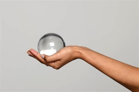 Hand Holding Sphere