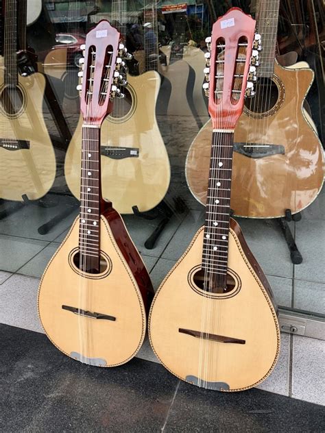 Đàn Mandolin Gỗ Hồng Đào cao cấp Đàn Mandolin Gỗ Hồng Đào cao cấp