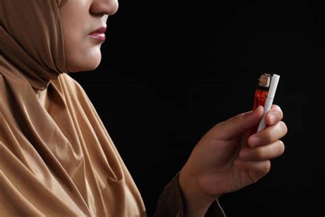 160+ Muslim Smoke Cigarettes Stock Photos, Pictures & Royalty-Free ...