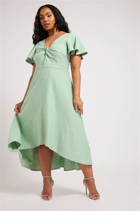 YOURS LONDON Plus Size Green Dipped Hemline Jacquard Dress | Yours Clothing