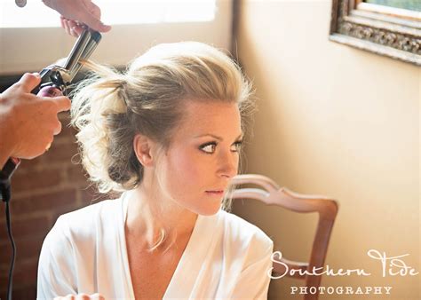 Bride getting her hair done. The Wedding Day goes by so fast, it's