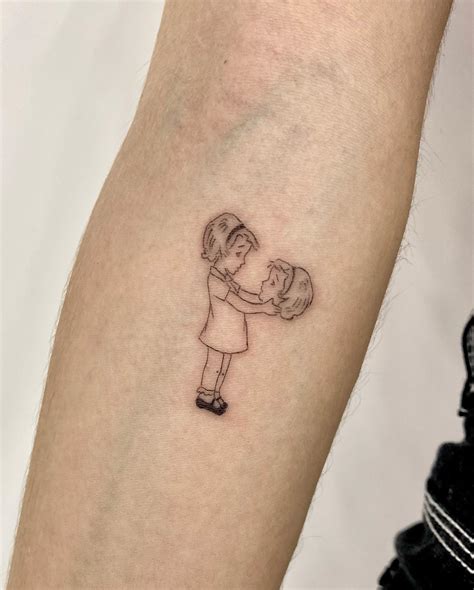 aged fine line tattoo 2