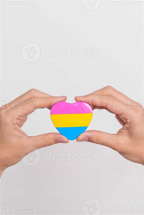 Pansexual Pride Day and LGBT pride month concept. hand holding pink