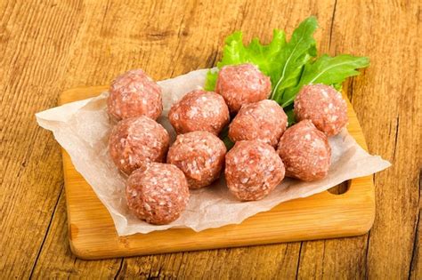 Premium Photo | Raw meat balls