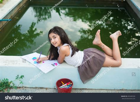 beautiful small girl lying face  stock photo  shutterstock