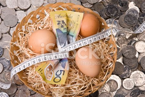financial nest egg tightening  budget stock photo royalty