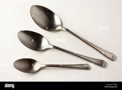 teaspoon desert spoon  tablespoon   white background stock photo