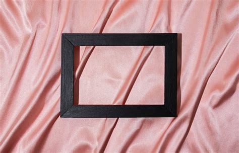 photo flat lay dark frame  silky material