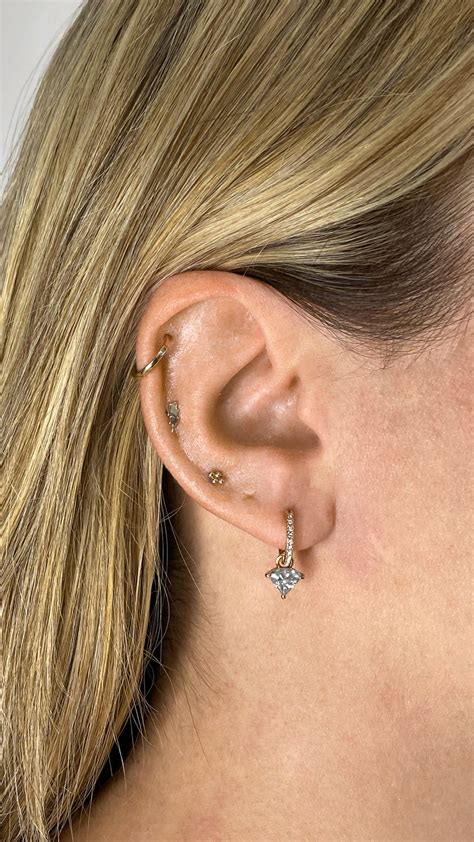 PIERCING — UPLIFT TATTOO & PIERCING