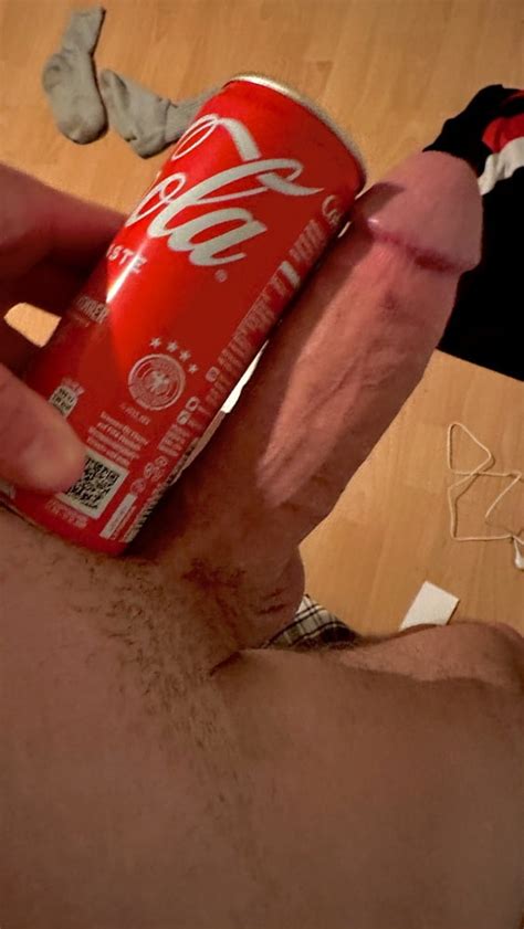 Big Dick between Coca Cola - 2 Pics | xHamster