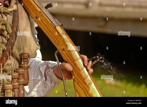 matchlock musket slow match burning  smoke spiraling jamestown