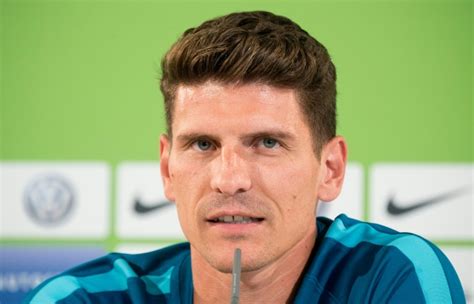 gomez targets champions league return  wolfsburg