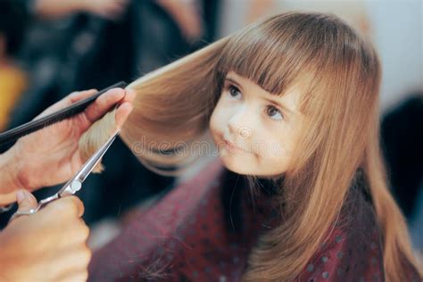 Cute Toddler Girl Getting Her Hair Cute in a Professional Salon Stock ...