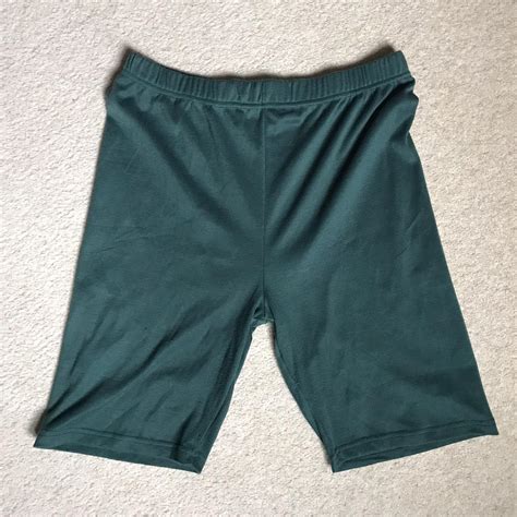 Dark green tight shorts (stretchy) Size M (roughly... - Depop