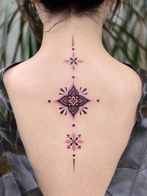 Details more than 83 spine tattoos female - in.coedo.com.vn