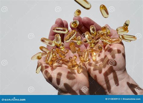 Omega Gelatin Capsules In A Glass Transparent Jar. Nutritional ...