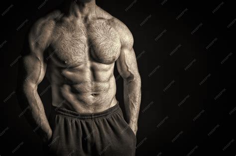 premium photo sexy muscular male torso  hairy chest  man workout