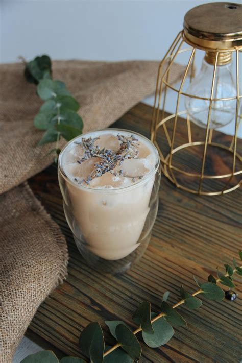 Light Bulb behind Coffee GlassFree Stock Photo