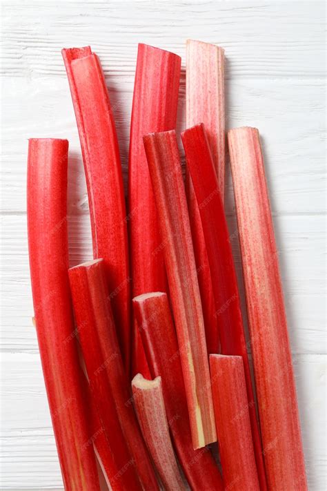 Free Photo | Ripe stalks of rhubarb on a light background