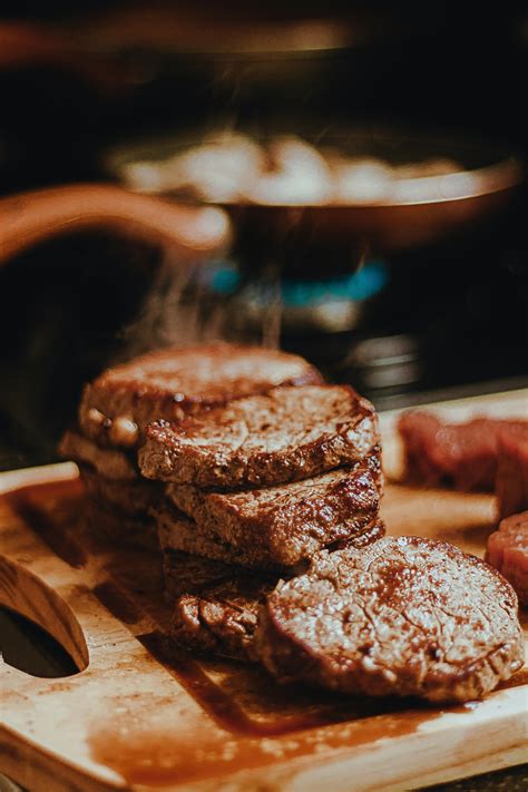 close  photo  cooked meat  wooden chopping board  stock photo