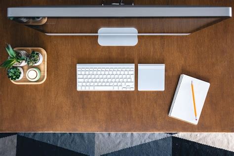 premium photo top view computer   wooden table work desk