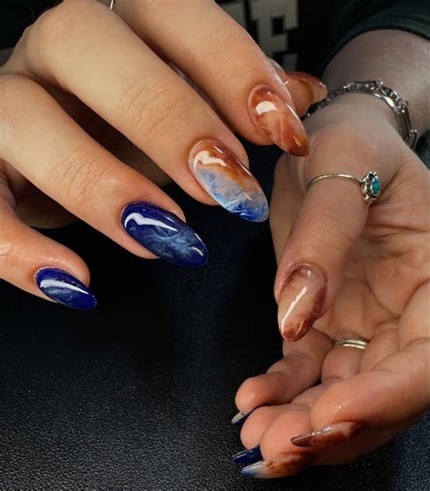 Nails by Anna on Instagram: "🫐🐟🌏🥥🐌🪐 • • • • • #bluenails #brownnails #