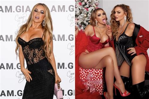 Carmen Electra, 51, rocks just red satin lingerie as she licks a candy ...