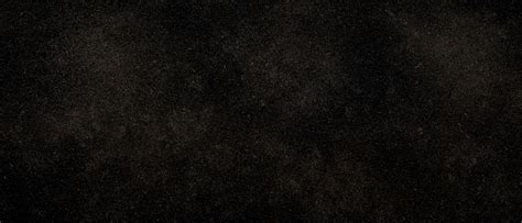 Grunge rough black distressed noise grain texture. Black granite slabs