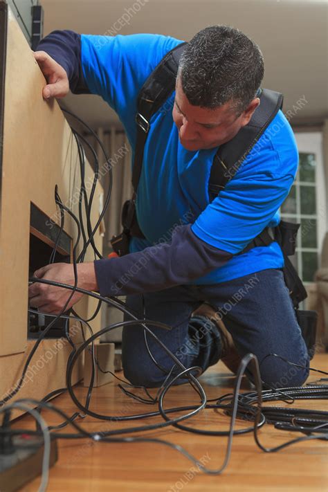 cable installer working   home stock image  science