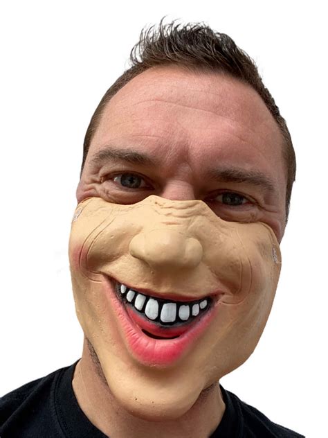 Download Funny Face Mask Worn By Man Picture | Wallpapers.com