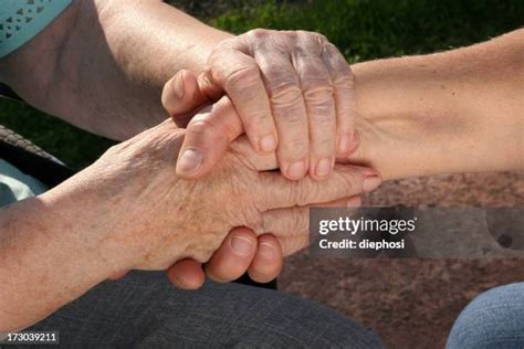 fingers intertwined   premium high res pictures getty images