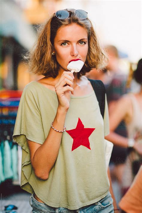 "Beautiful Young Traveller Eating Ice Cream On The Street In Thailand
