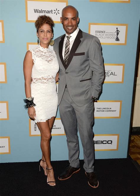 Download Actress Nicole Ari Parker Smiling Radiantly in a Beautiful