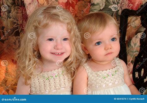 Sweet Sisters stock photo. Image of ecru, fair, families - 6041874