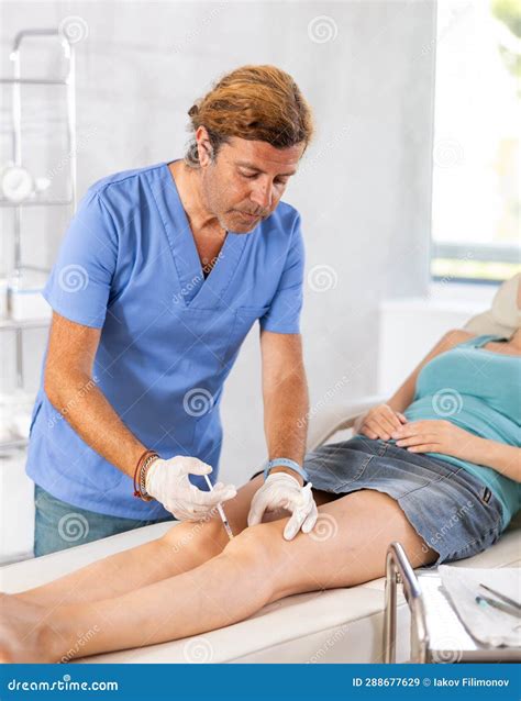 Injection of the Knee - Modern Method of Treating Knee Joints. Stock