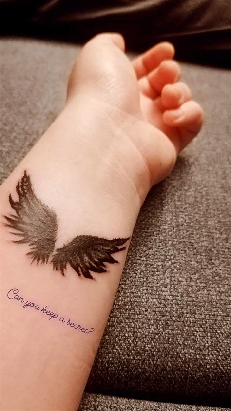 Stunning Raven Wings Tattoo: A Symbol of Mystery and Power