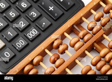 ancient abacus  modern calculator stock photo alamy