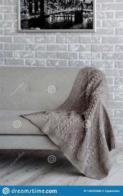 The Elegant Handmade Blanket Lies on the Sof Stock Photo - Image of ...