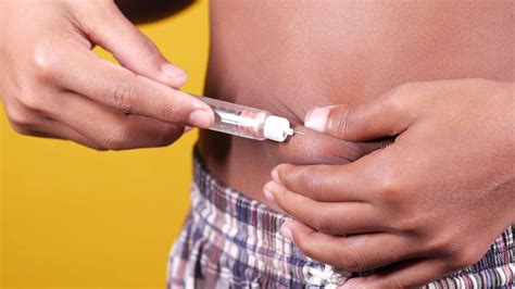 young man hand using insulin pen close up 15808149 Stock Video at Vecteezy