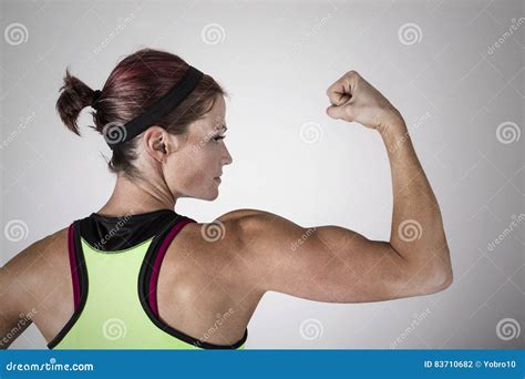 woman flexing biceps royalty  stock photo cartoondealercom
