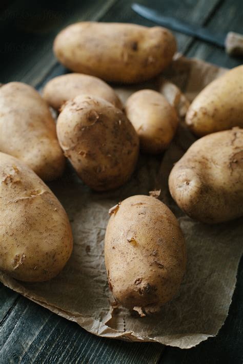 "Potatoes" by Stocksy Contributor "Davide Illini" - Stocksy