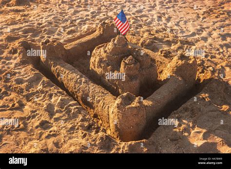 Sandcastle with USA flag Stock Photo - Alamy